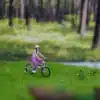 Figurine 1/87 - femme cycliste